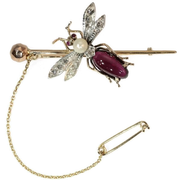 Antique pin with bejeweled insect